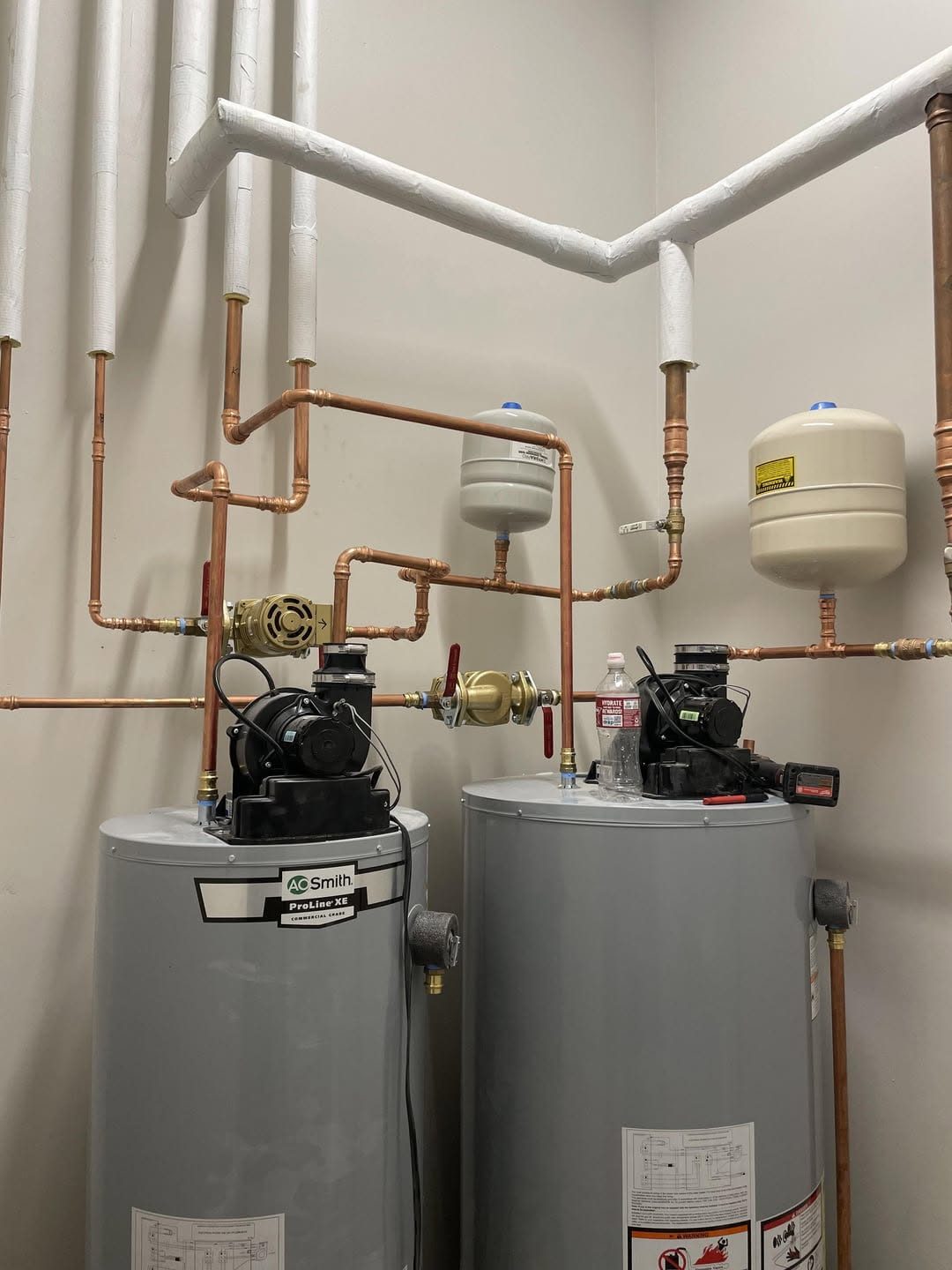 Twin water-heater install — Paramount Plumbing
